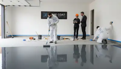 Professional epoxy garage floor coating in Troy, MI with durable, glossy finish for lasting protection